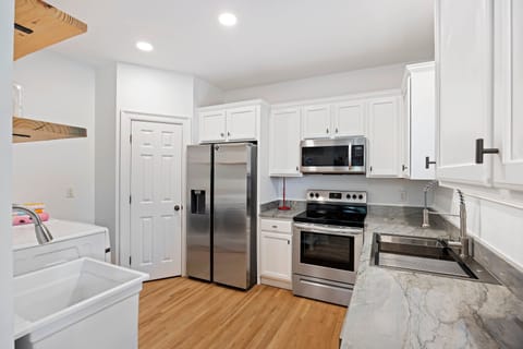 First Floor Kitchen Area with Full-Sized Appliances, Wet Bar, Coffee Bar and Laundry
