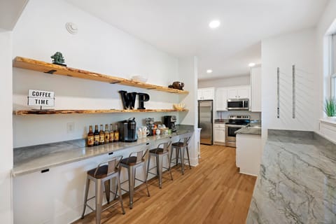 First Floor Kitchen Area with Full-Sized Appliances, Wet Bar, Coffee Bar and Laundry