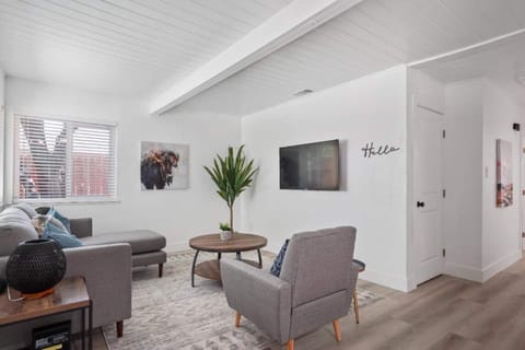 Lounge with our 65" Roku Smart TV!