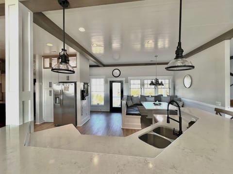 Kitchen with outdoor grilling deck