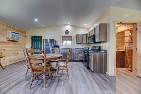 Kitchen with stainless steel appliances, full oven and fridge