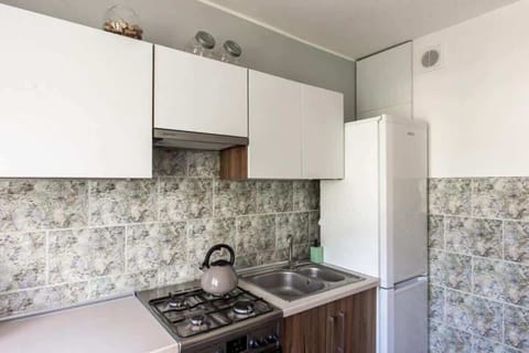 The kitchen features a stylish and functional design. 
