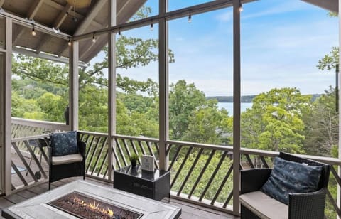 Screened in patio overlooking lake