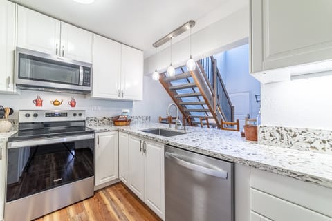 Updated kitchen with quartz countertop.