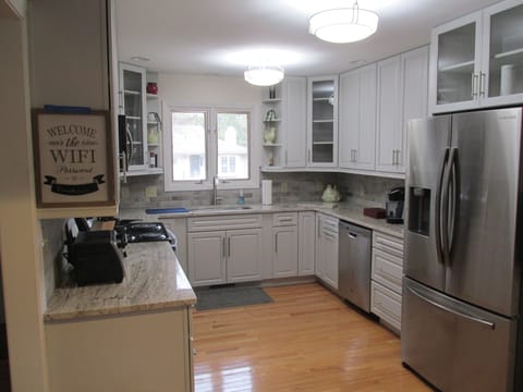 New gourmet kitchen layout 2023, all new appliances and lighting