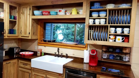 Kitcheb sink with view of lake.