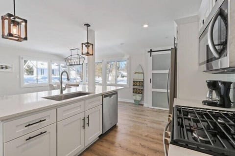 Open kitchen, gas stove, drip coffee maker