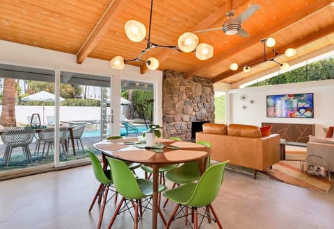 Great room with polished concrete floors, hand-laid stone fireplace