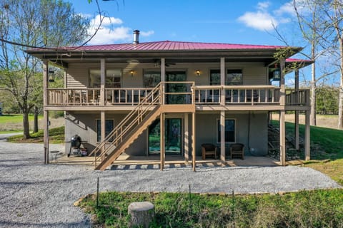 Wrap around deck faces river and open field