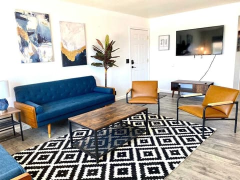Modern furnishings & smart screen TVs in both living areas