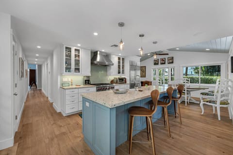 Sub Zero and Wolf appliances appoint the  center of activity and great room.