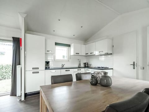 Table, Furniture, Plant, Building, Cabinetry, Window, Interior Design, Wood, Floor, Flooring