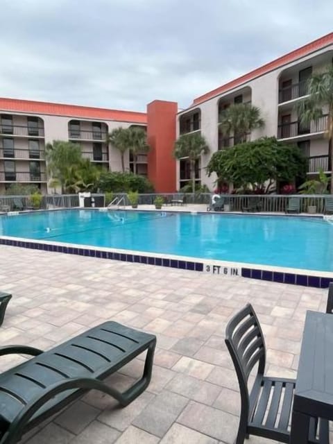 Unwind at dusk beside the glowing pool and serene courtyard.