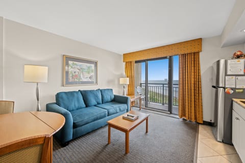 The ocean front living room is well-appointed with comfortable furnishings.