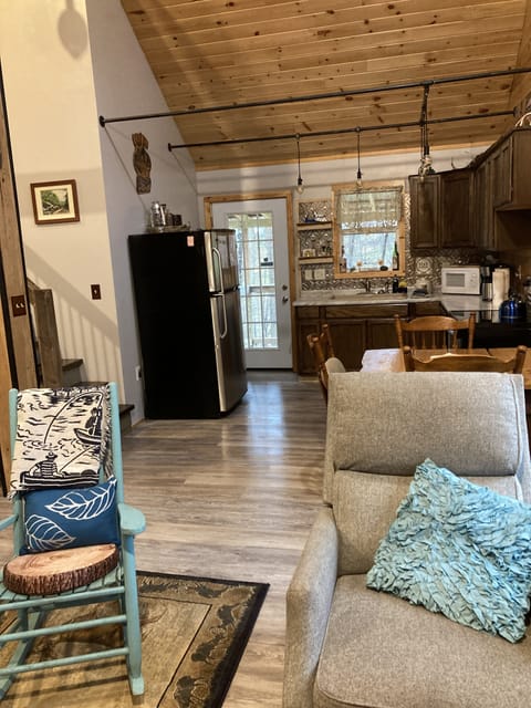 Kitchen view from living room
Door leads out into back porch and gas grill 