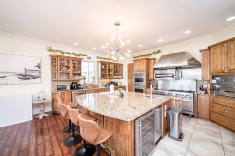 Large commercial kitchen with many amenities for any chef!