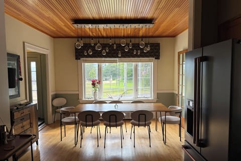 Main dining room with incredible morning views of the sun rising over Whiteface.