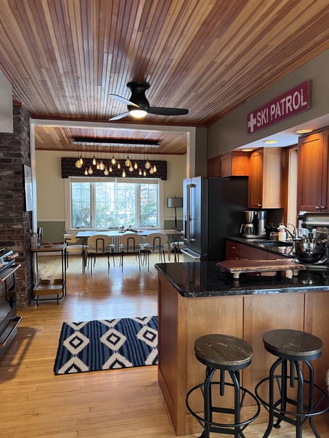 Chef's kitchen open to the dining room.