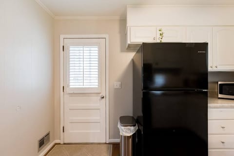 Backdoor by the kitchen.