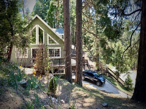 View of house from lookout point on hillside.