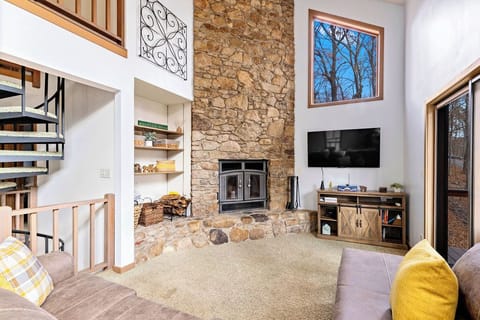 Main Living Area.  Enjoy this wood burning fireplace and cozy living space.