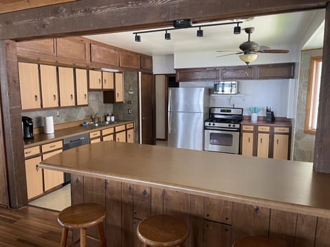 Open kitchen with view to the lake.  All kitchen utensils and dishes provided.