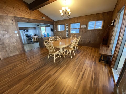 Table has additional bench to seat up to 10