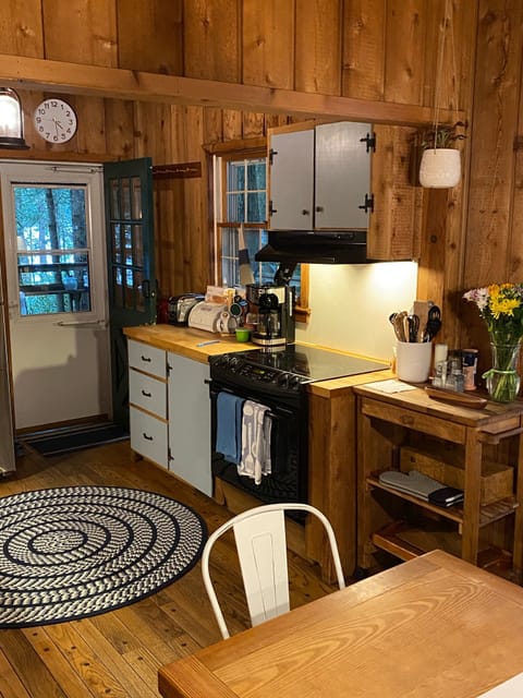 Kitchen is stocked with pots, pans, utensils, glassware and more!