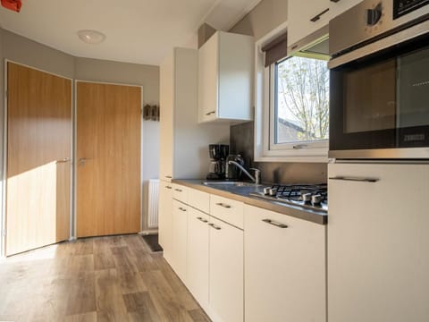 Cabinetry, Kitchen Sink, Sink, Countertop, Kitchen, Wood, Tap, Kitchen Stove, Interior Design, Kitchen Appliance