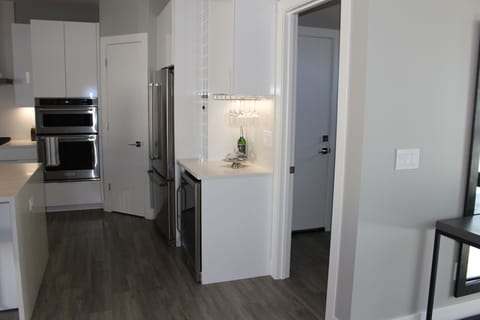 Wine bar and two-zone wine cooler. 