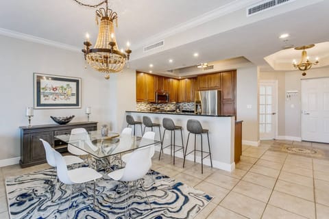 Plenty of seating around the dining table and kitchen bar