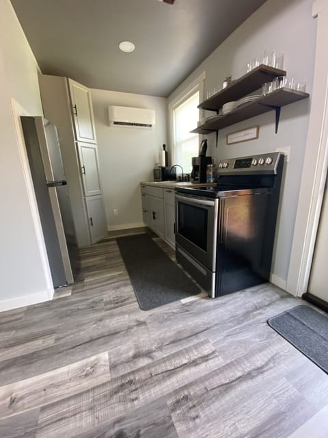 open shelves made from reclaimed barn wood
