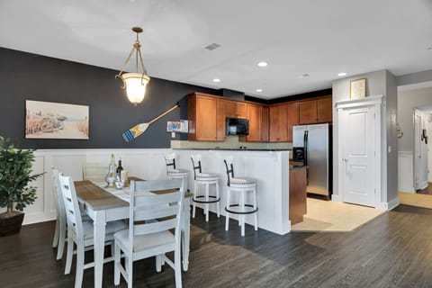 Dining room seats 9 using the breakfast bar.