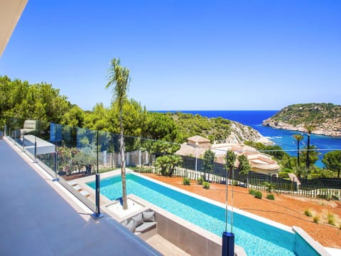 Water, Sky, Plant, Property, Building, Seaside Resort, Azure, Swimming Pool, Tree, Outdoor Furniture