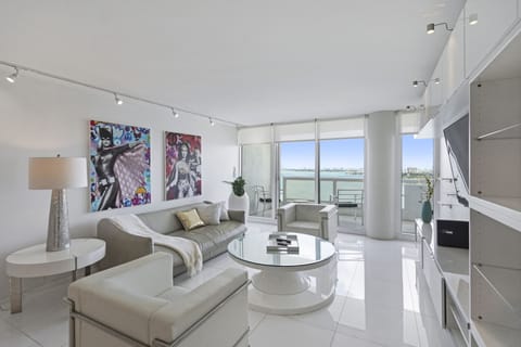 Living room, balcony access, Roku tv, water views!