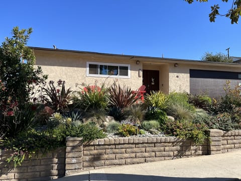 4 bedroom  home with large backyard, deck, front patio and spa soon early April 