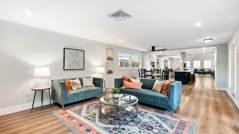 Formal living area looking out to your private front courtyard!