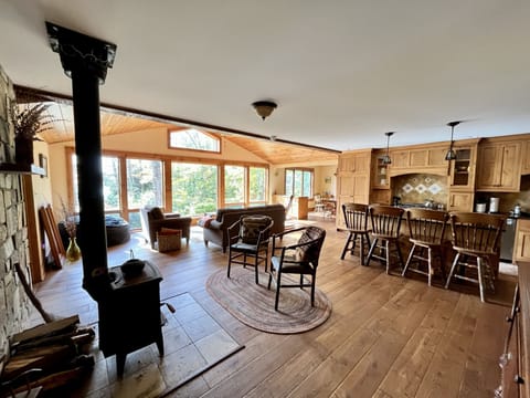 The Great Room - kitchen, dining room, living room, sitting area with wood stove
