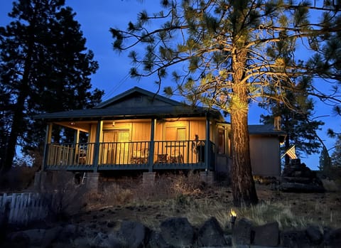 Side of cabin at dusk
