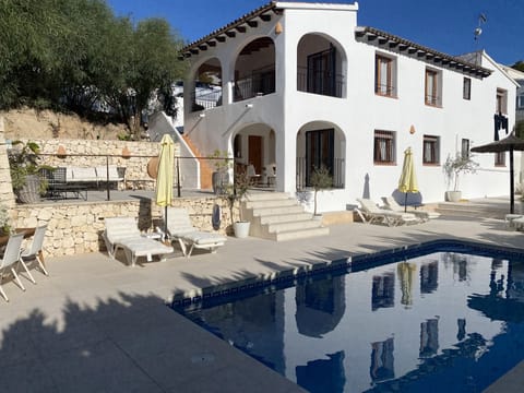 Private swimming pool and large terrace area with Barbecue and outdoor eating