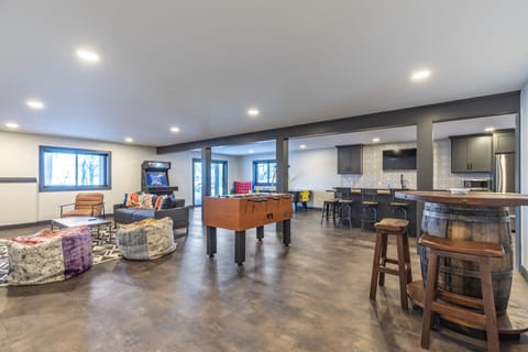 Basement living area with bar and games!
