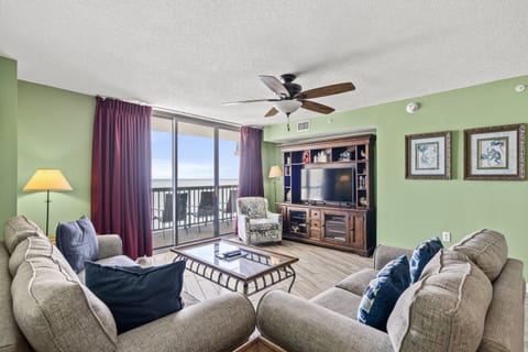 The ocean front living room is well-appointed with comfortable furnishings.