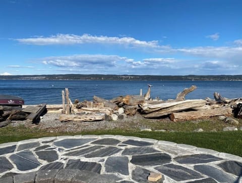 View east to Camano Island from backyard fire pit. Mount Baker seen on far left.