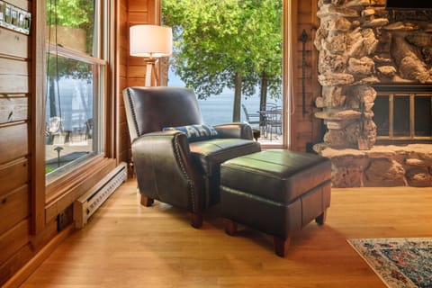 One of the best features about this large leather chair and ottoman is its reading light, which makes it perfect for an indoor spot to enjoy your favorite book or magazine!