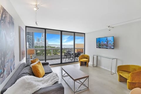 Living area, balcony access, Roku streaming TV