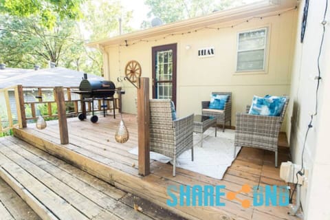 It features a back patio that opens onto the spacious backyard.