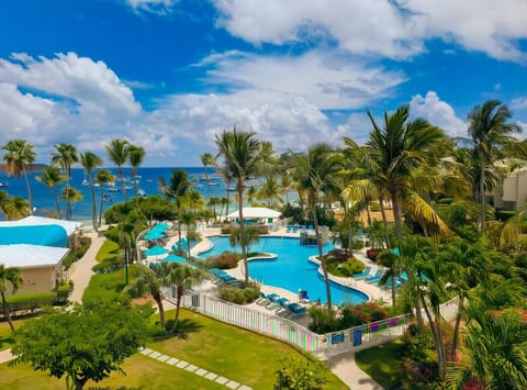 The Elysian pool and hot tub right on the beach - free access for you and your guests!