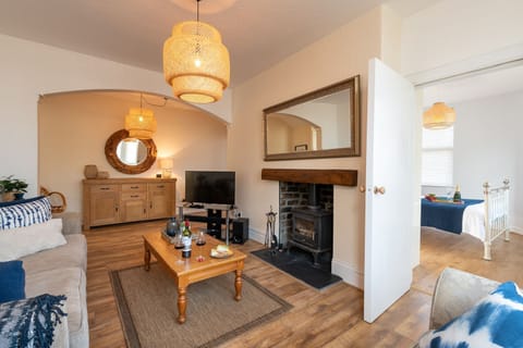 Bryn Awel Bach Living room with bedroom shot