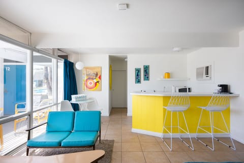 Kick your feet up in this full apartment style suite.