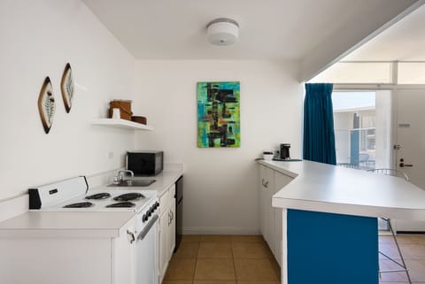 Colorful kitchenette.